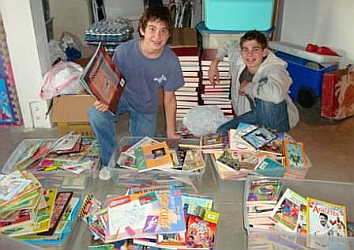 Nick and Michael Camarda sorting donated books