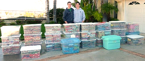 Michael and Nick Camarda ready to transport donated gift-wrapped books